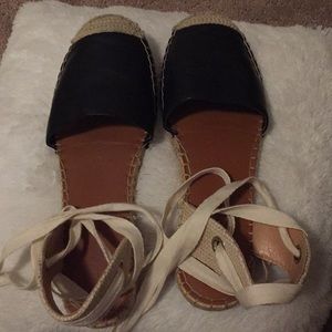 Black and white tie sandals